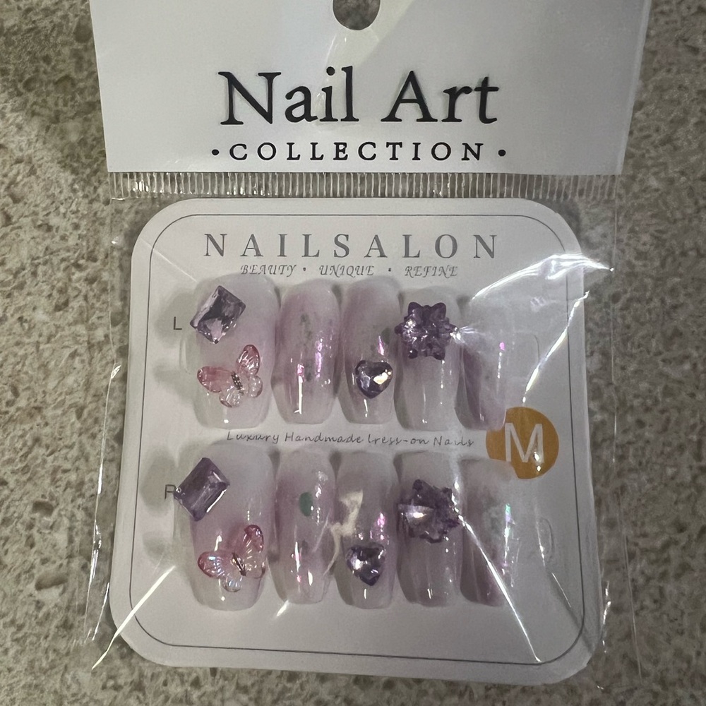 Press on nails. Purple butterflies and gems